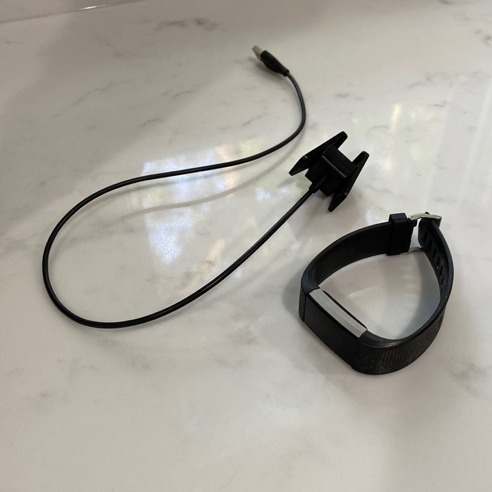 Black Fitbit Charge 2 with Charger